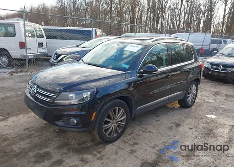 2014 Volkswagen Tiguan Sel z USA, uszkodzony, nr VIN WVGBV3AX3EW531961